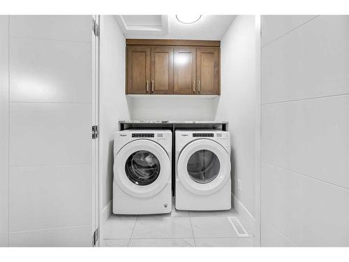 219 Kinniburgh Place, Chestermere, AB - Indoor Photo Showing Laundry Room