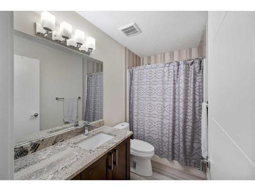 219 Kinniburgh Place, Chestermere, AB - Indoor Photo Showing Bathroom