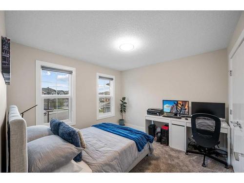 219 Kinniburgh Place, Chestermere, AB - Indoor Photo Showing Bedroom