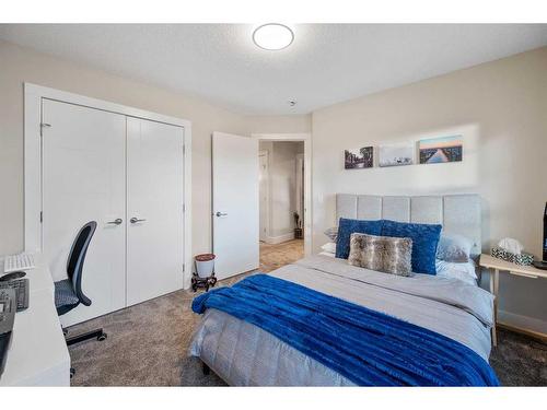 219 Kinniburgh Place, Chestermere, AB - Indoor Photo Showing Bedroom