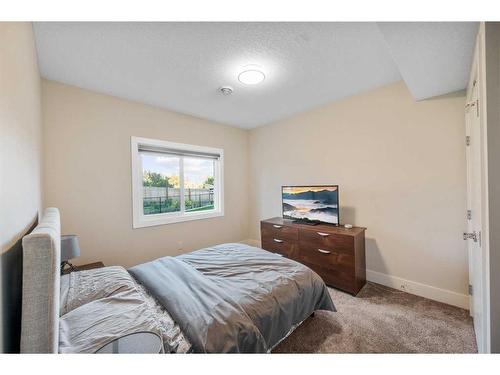 219 Kinniburgh Place, Chestermere, AB - Indoor Photo Showing Bedroom