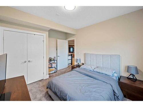 219 Kinniburgh Place, Chestermere, AB - Indoor Photo Showing Bedroom