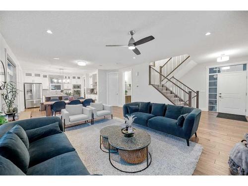 219 Kinniburgh Place, Chestermere, AB - Indoor Photo Showing Living Room