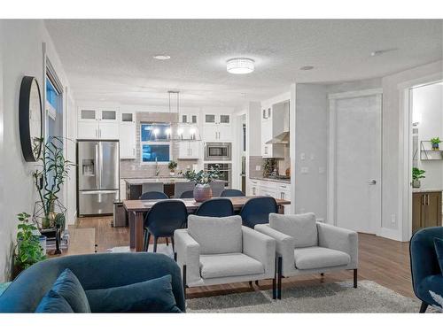 219 Kinniburgh Place, Chestermere, AB - Indoor Photo Showing Living Room