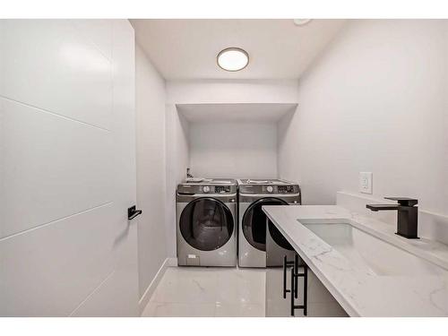 38 Armstrong Crescent Se, Calgary, AB - Indoor Photo Showing Laundry Room