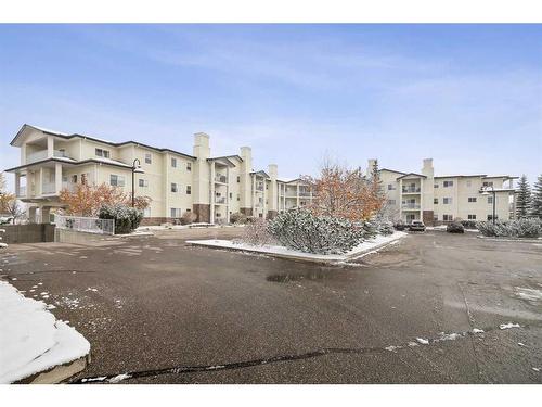 #216-72 Quigley Drive, Cochrane, AB - Outdoor