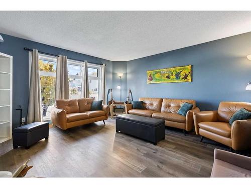 172 Cramond Crescent Se, Calgary, AB - Indoor Photo Showing Living Room