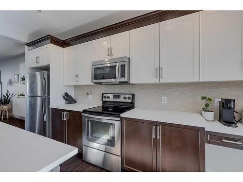 79 Cranford Park Se, Calgary, AB - Indoor Photo Showing Kitchen With Stainless Steel Kitchen