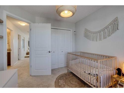 79 Cranford Park Se, Calgary, AB - Indoor Photo Showing Bedroom