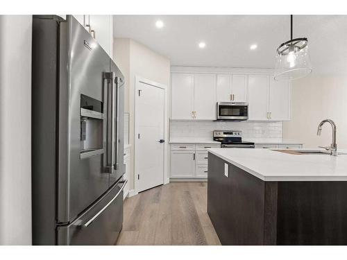 16 Williams Avenue, Olds, AB - Indoor Photo Showing Kitchen With Upgraded Kitchen