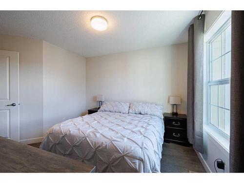 222 Nolanfield Villas Nw, Calgary, AB - Indoor Photo Showing Bedroom