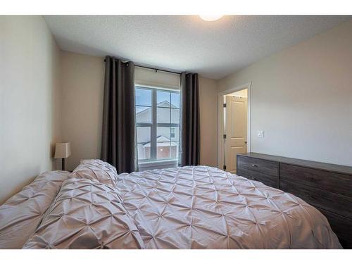 222 Nolanfield Villas Nw, Calgary, AB - Indoor Photo Showing Bedroom