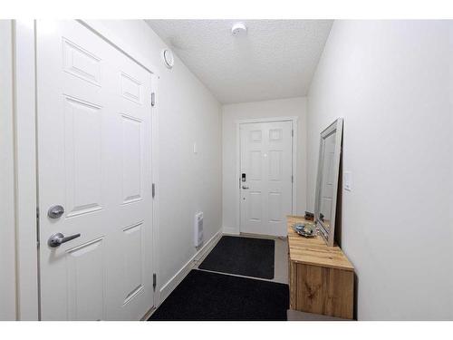 222 Nolanfield Villas Nw, Calgary, AB - Indoor Photo Showing Other Room