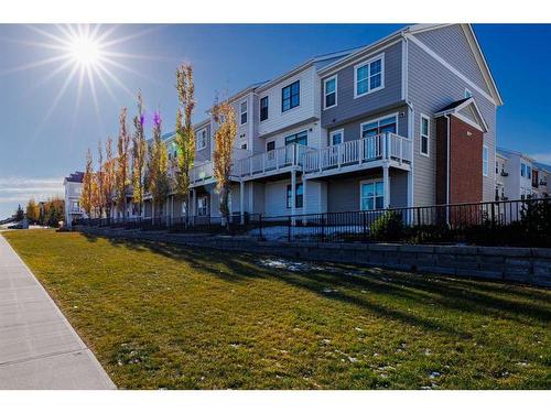 222 Nolanfield Villas Nw, Calgary, AB - Outdoor With Deck Patio Veranda With Facade