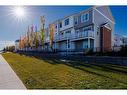 222 Nolanfield Villas Nw, Calgary, AB  - Outdoor With Deck Patio Veranda With Facade 