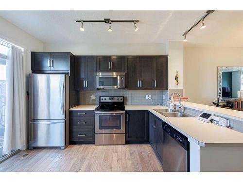 222 Nolanfield Villas Nw, Calgary, AB - Indoor Photo Showing Kitchen With Stainless Steel Kitchen With Double Sink With Upgraded Kitchen