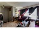 7844 21A Street Se, Calgary, AB  - Indoor Photo Showing Living Room 