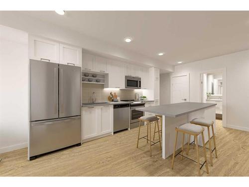 908-210 18 Avenue Sw, Calgary, AB - Indoor Photo Showing Kitchen With Stainless Steel Kitchen With Upgraded Kitchen