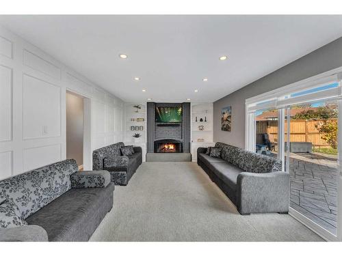 304 Pinemill Way Ne, Calgary, AB - Indoor With Fireplace