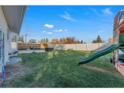 304 Pinemill Way Ne, Calgary, AB - Outdoor With Backyard