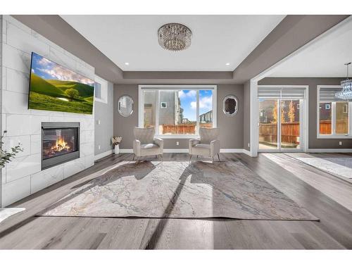 137 Cityside Road Ne, Calgary, AB - Indoor Photo Showing Living Room With Fireplace