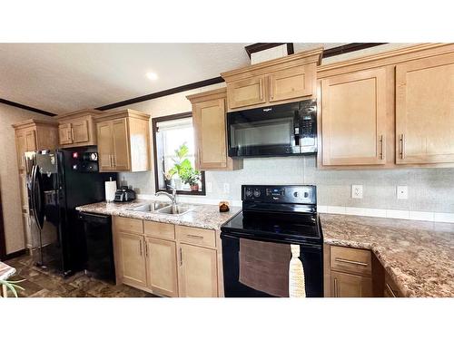 31479 Range Road 52, Rural Mountain View County, AB - Indoor Photo Showing Kitchen With Double Sink