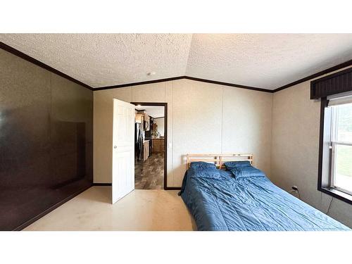 31479 Range Road 52, Rural Mountain View County, AB - Indoor Photo Showing Bedroom