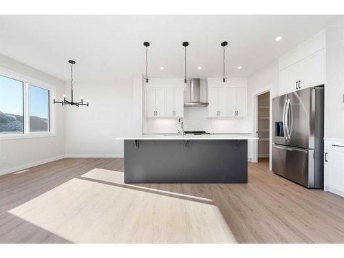 11 Creekstone Gardens Sw, Calgary, AB - Indoor Photo Showing Kitchen With Stainless Steel Kitchen With Upgraded Kitchen