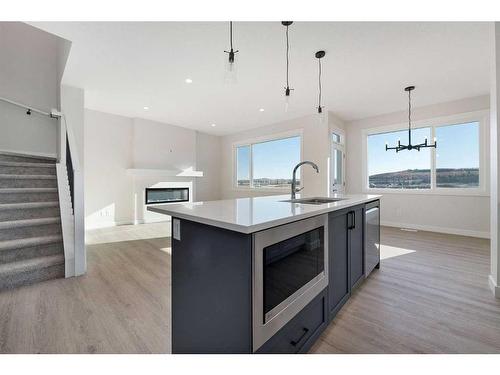 11 Creekstone Gardens Sw, Calgary, AB - Indoor Photo Showing Kitchen With Upgraded Kitchen