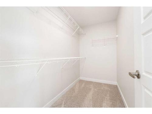 11 Creekstone Gardens Sw, Calgary, AB - Indoor With Storage