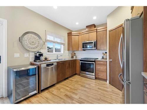 2037 New Brighton Park Se, Calgary, AB - Indoor Photo Showing Kitchen With Double Sink