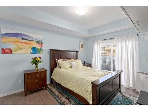 105-4250 Seton Drive Se, Calgary, AB - Indoor Photo Showing Bedroom