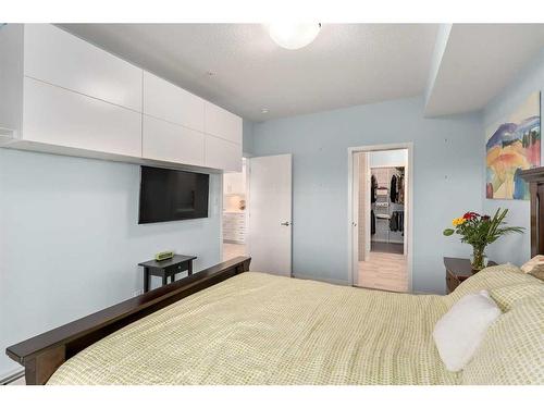 105-4250 Seton Drive Se, Calgary, AB - Indoor Photo Showing Bedroom