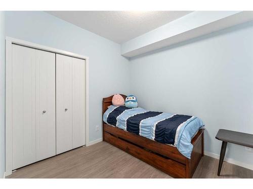 105-4250 Seton Drive Se, Calgary, AB - Indoor Photo Showing Bedroom