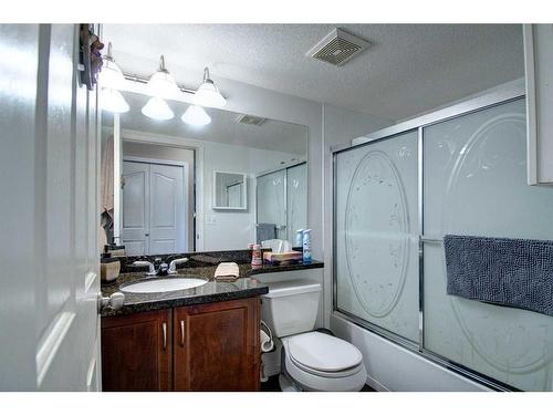 7413-304 Mackenzie Way Sw, Airdrie, AB - Indoor Photo Showing Bathroom