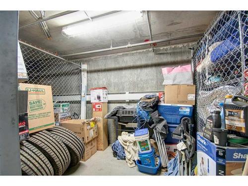 7413-304 Mackenzie Way Sw, Airdrie, AB - Indoor With Storage