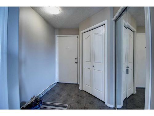 7413-304 Mackenzie Way Sw, Airdrie, AB - Indoor Photo Showing Other Room