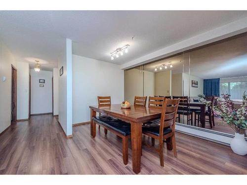 102-3719B 49 Street Nw, Calgary, AB - Indoor Photo Showing Dining Room