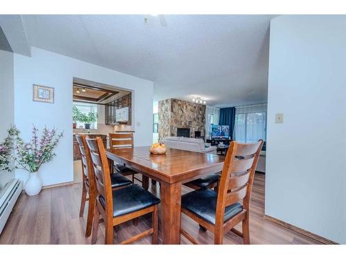 102-3719B 49 Street Nw, Calgary, AB - Indoor Photo Showing Dining Room