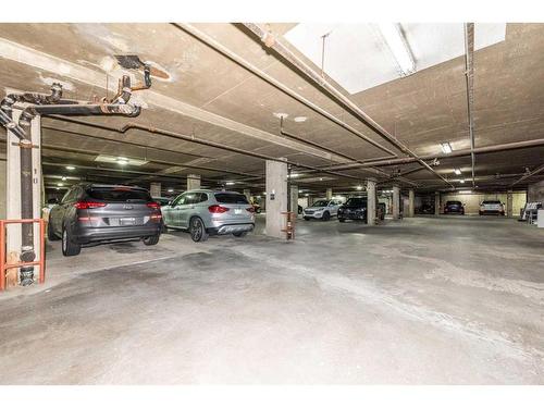 102-3719B 49 Street Nw, Calgary, AB - Indoor Photo Showing Garage