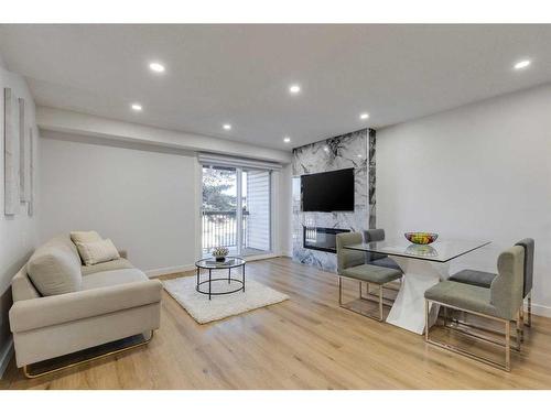 79-3745 Fonda Way Se, Calgary, AB - Indoor Photo Showing Living Room