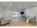 79-3745 Fonda Way Se, Calgary, AB  - Indoor Photo Showing Living Room 