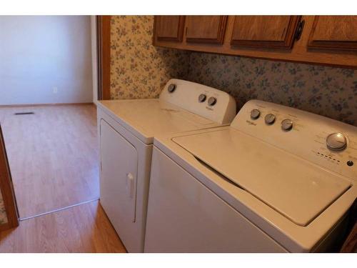 24-Riley St Street, High River, AB - Indoor Photo Showing Laundry Room