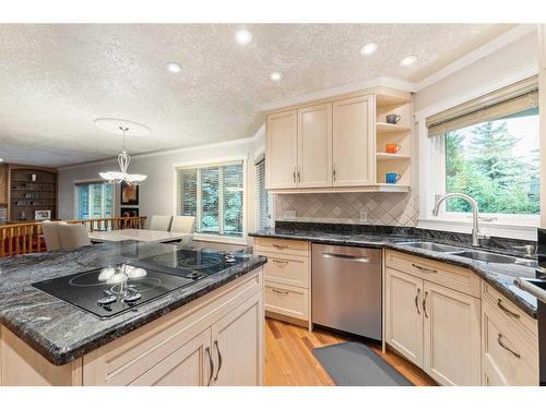 143 Christie Knoll Heights Sw, Calgary, AB - Indoor Photo Showing Kitchen With Double Sink