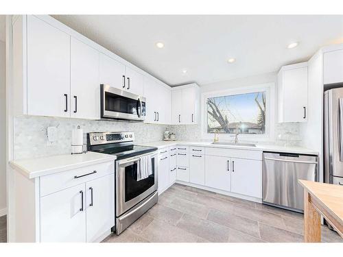 7803 Silver Springs Road Nw, Calgary, AB - Indoor Photo Showing Kitchen With Stainless Steel Kitchen With Upgraded Kitchen