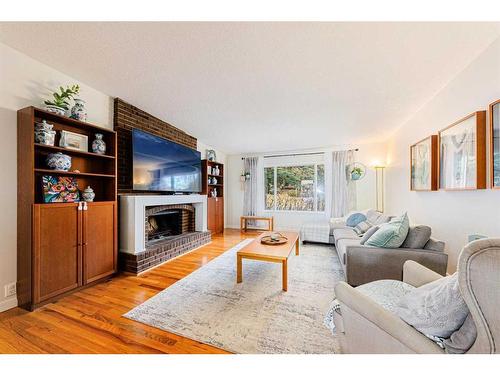 7803 Silver Springs Road Nw, Calgary, AB - Indoor Photo Showing Living Room With Fireplace