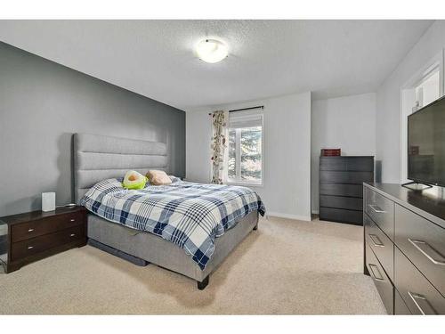 131 Prestwick Villas Se, Calgary, AB - Indoor Photo Showing Bedroom