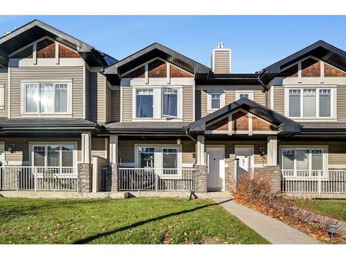 131 Prestwick Villas Se, Calgary, AB - Outdoor With Deck Patio Veranda With Facade