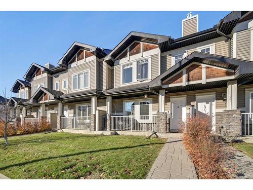 131 Prestwick Villas Se, Calgary, AB - Outdoor With Deck Patio Veranda With Facade