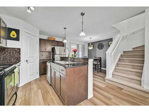 131 Prestwick Villas Se, Calgary, AB - Indoor Photo Showing Kitchen With Upgraded Kitchen